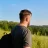 middle-aged-bearded-man-with-a-backpack-on-a-hike-2024-12-08-04-27-09-utc