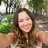 portrait-smiling-young-woman-taking-selfie-park